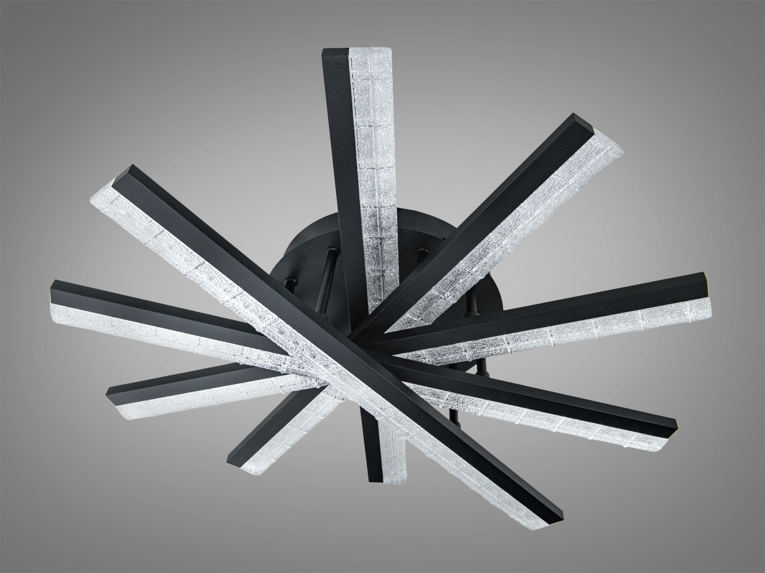 Настінний світильник з чорними променями, що перетинаються, з прозорими вставками. Підходить для освітлення вітальні.