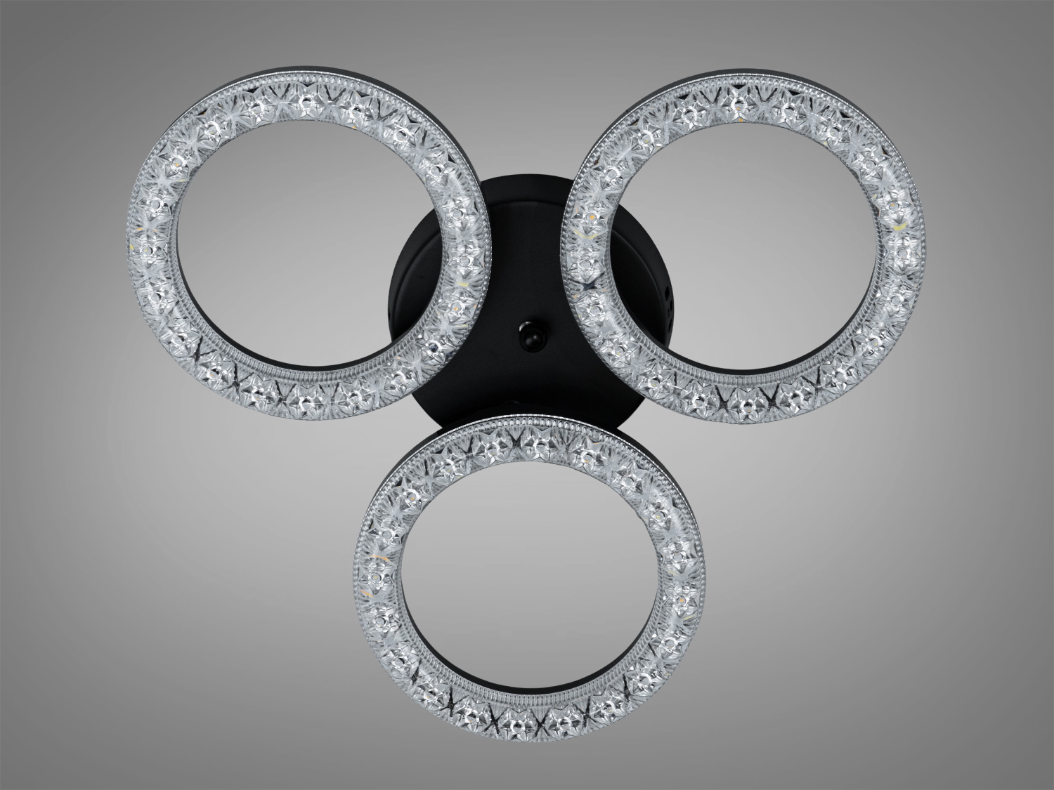 Світильник із трьома кристалічними кільцями, холодне світло, чорна основа. Ідеально для офісного простору.