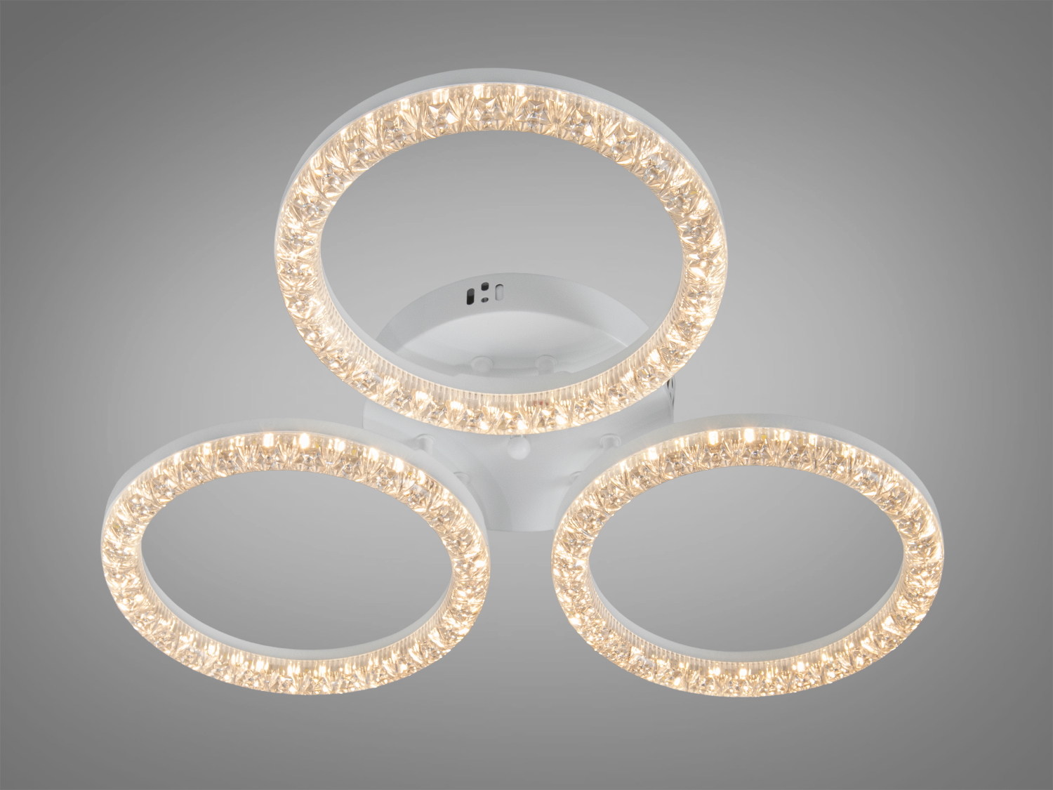 Три круглі світильники з теплим жовтим світлом, прикрашені кристалами. Підходять для затишного інтер′єру.