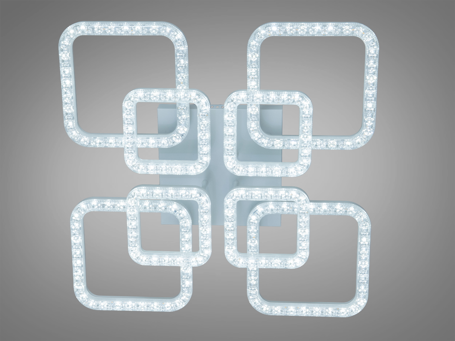 Світильник з шістьма квадратами, що випромінюють холодне біле світло. Ідеальний для офісних приміщень.