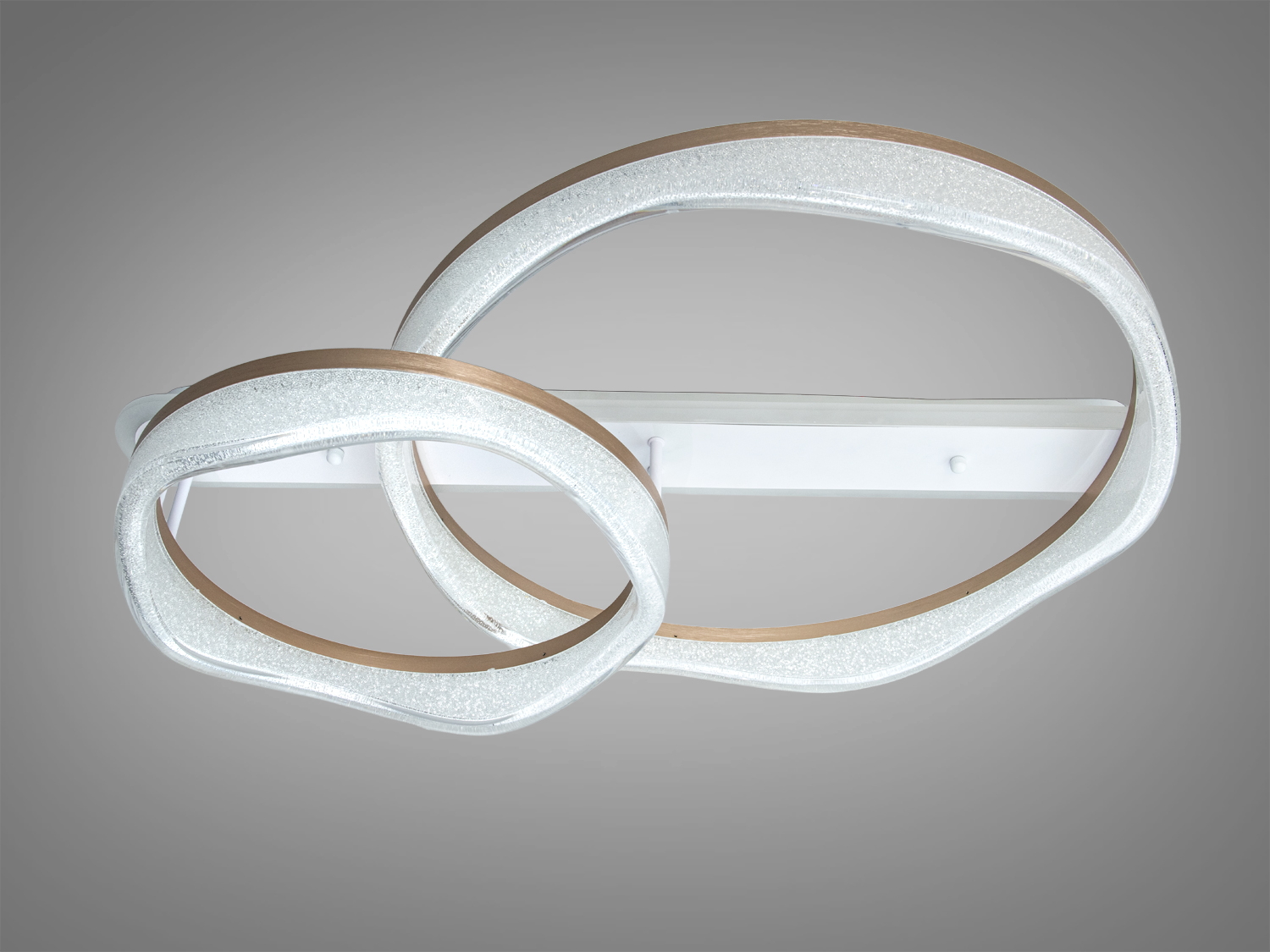 Світильник з металевим корпусом, два переплетених акрилових кільця, підходить для стельового монтажу в сучасному інтер′єрі.