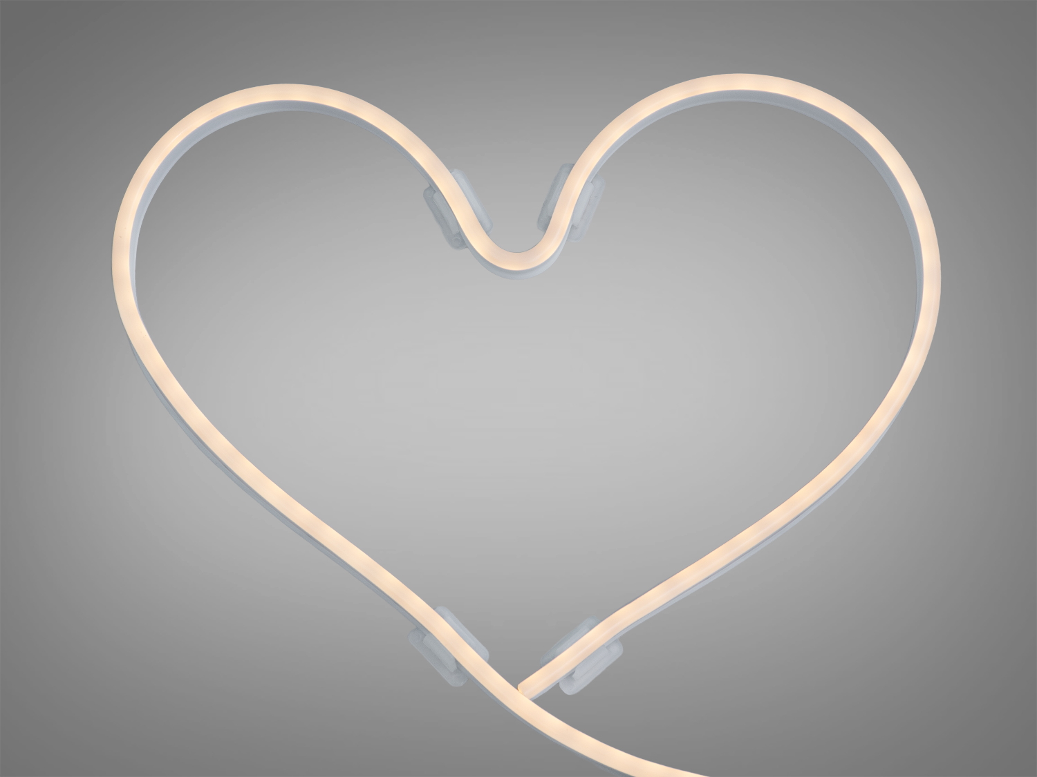 Світлодіодна стрічка зігнута у формі серця, підходить для романтичного освітлення в інтер’єрі.