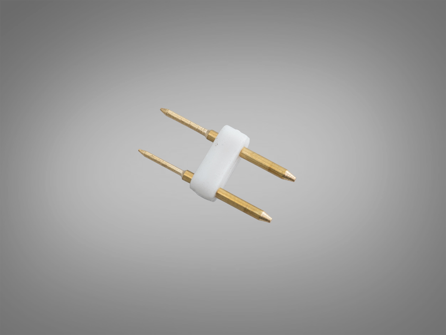 Ламповий цоколь із двома металевими контактами та пластиковою основою, призначений для підключення до лінійних світильників.