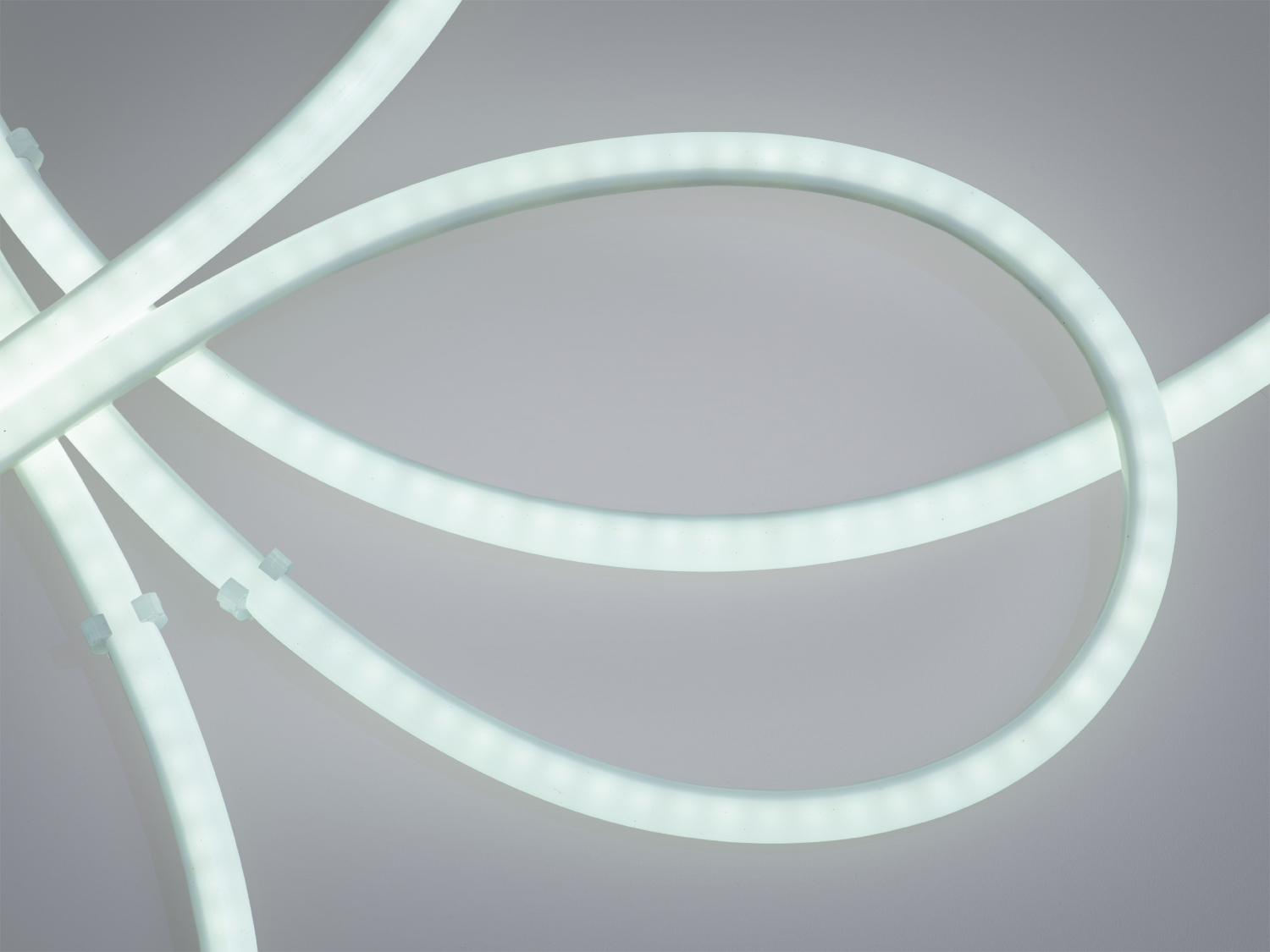 Світлодіодна стрічка у вигляді переплетених ліній, підходить для монтажу на стінах.