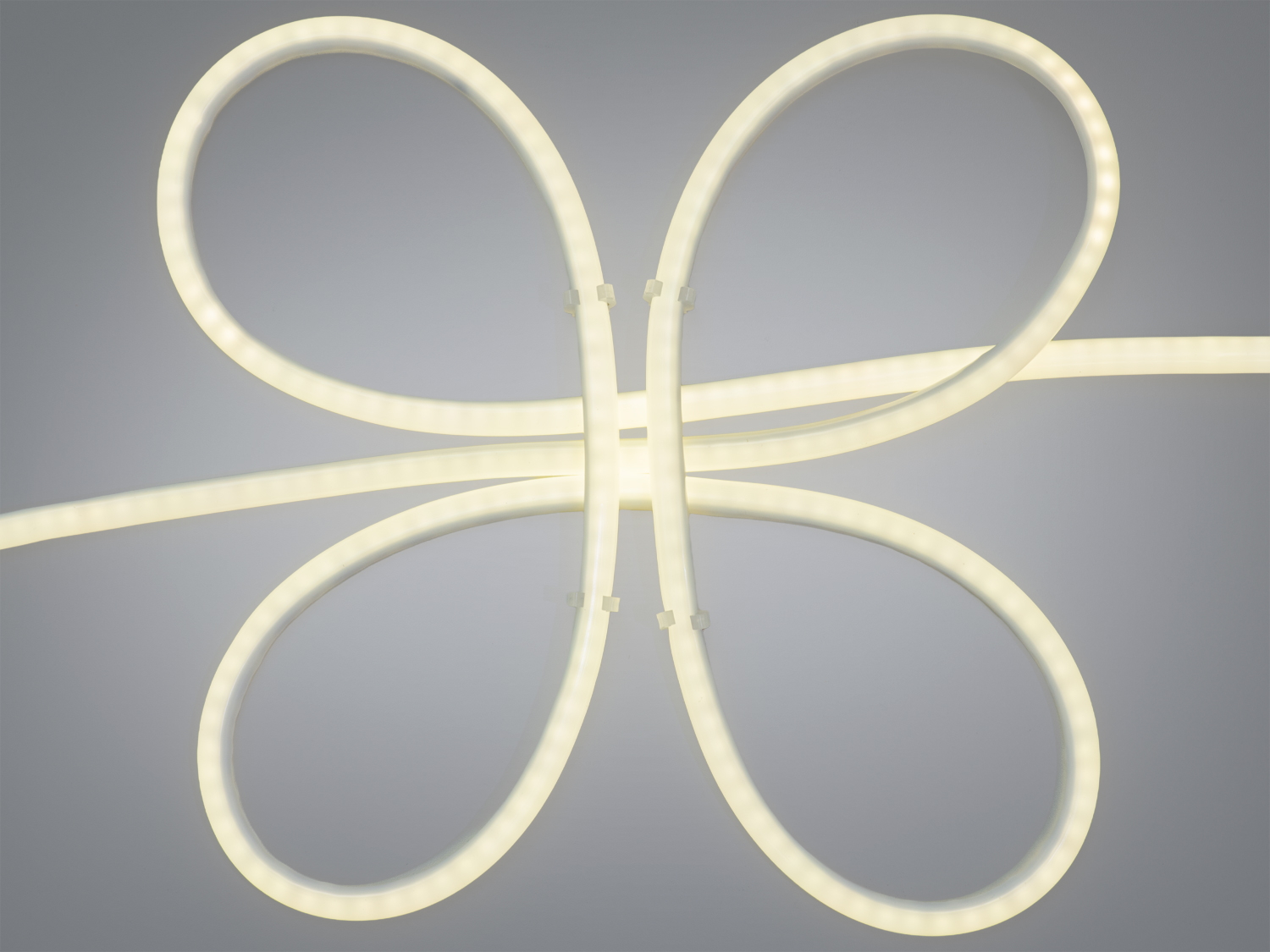 Круглий гнучкий LED неон 220В 12 мм IP67, нейтральне світло. SMD2835, 8 Вт/м, 800 лм/м, кут 180°, крок різання 100 мм, мінімальний радіус вигину 25 мм.