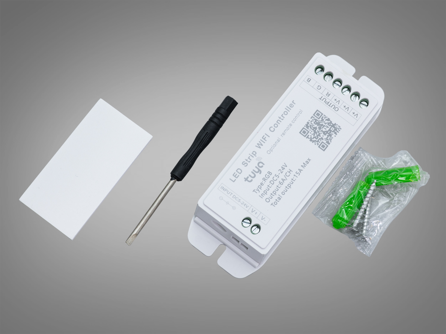 WiFi контролер TUYA для RGB та адресних LED стрічок 5–24В, 6A×3CH, до 432 Вт. Керування через додаток, монтажна пластина та викрутка в комплекті.