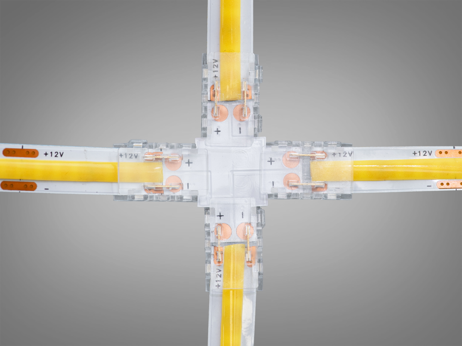 Прозорий конектор для світлодіодних стрічок з чотирма напрямками, забезпечує з′єднання у формі хреста, підходить для 12V систем.