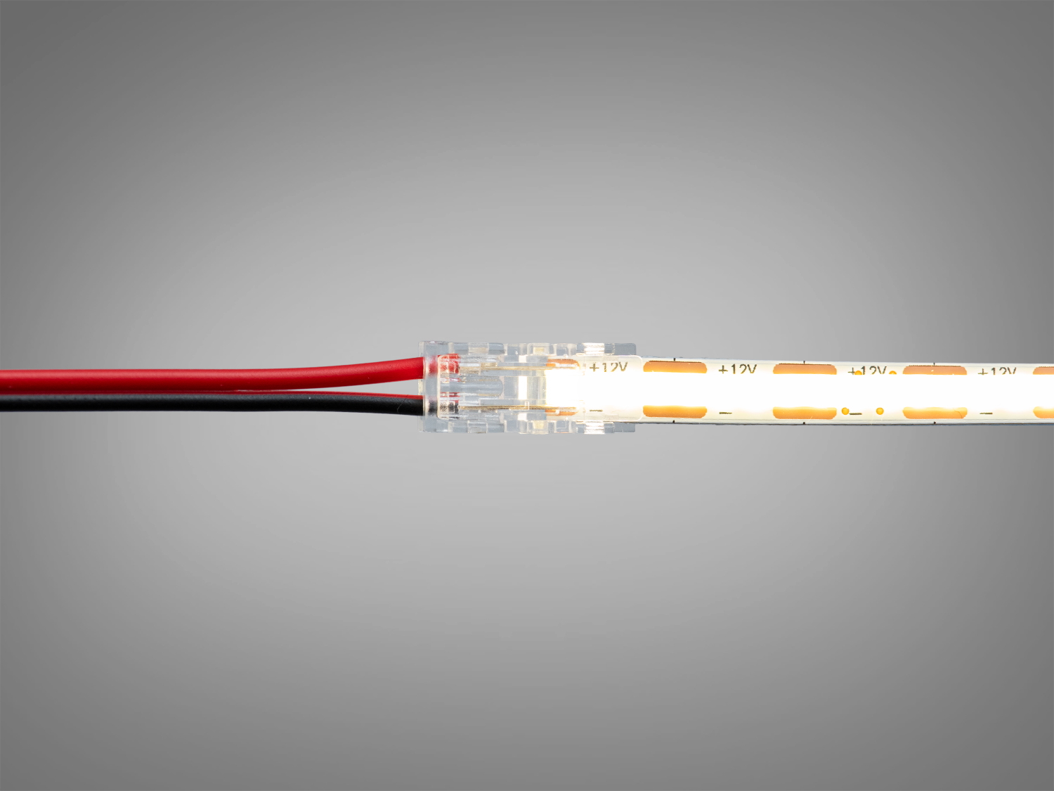 Світлодіодна стрічка підключена до роз′єму з червоним і чорним проводами. Використовується для освітлення інтер′єру.