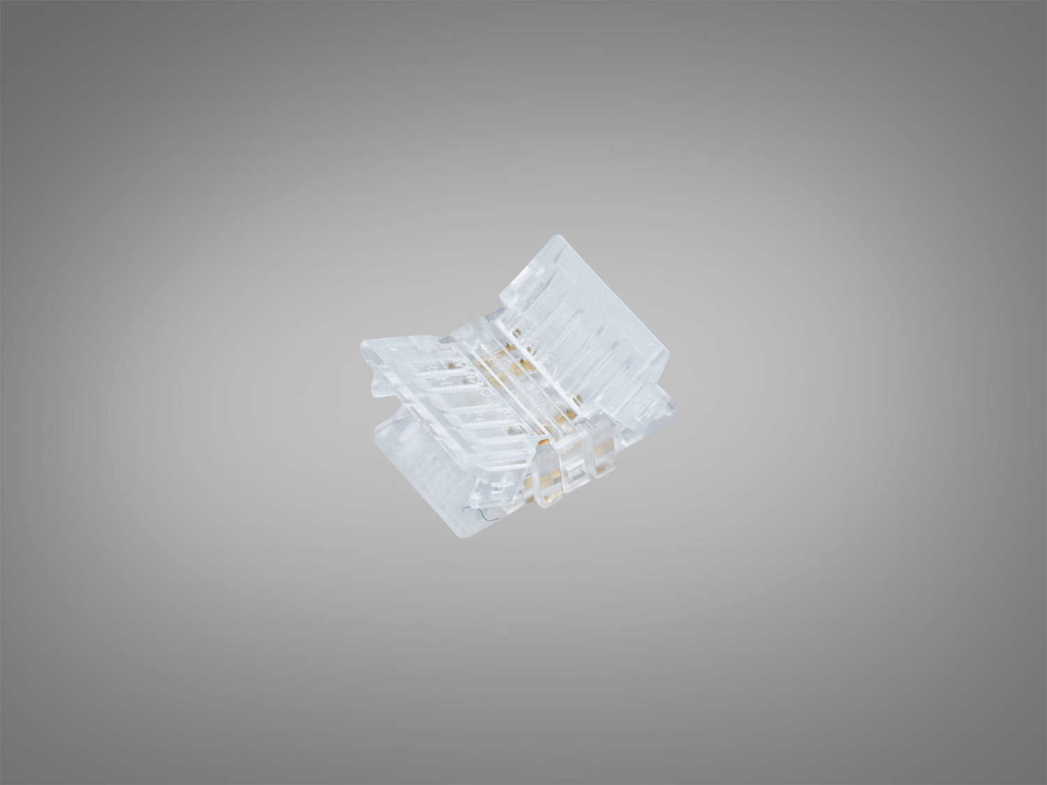 Прозорий пластиковий конектор для LED стрічок з двома контактами, призначений для з′єднання без пайки.