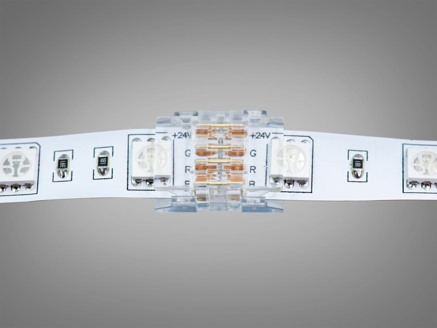 Прозорий конектор встановлений на світлодіодну стрічку, забезпечує надійне з′єднання, підходить для RGB-стрічок.