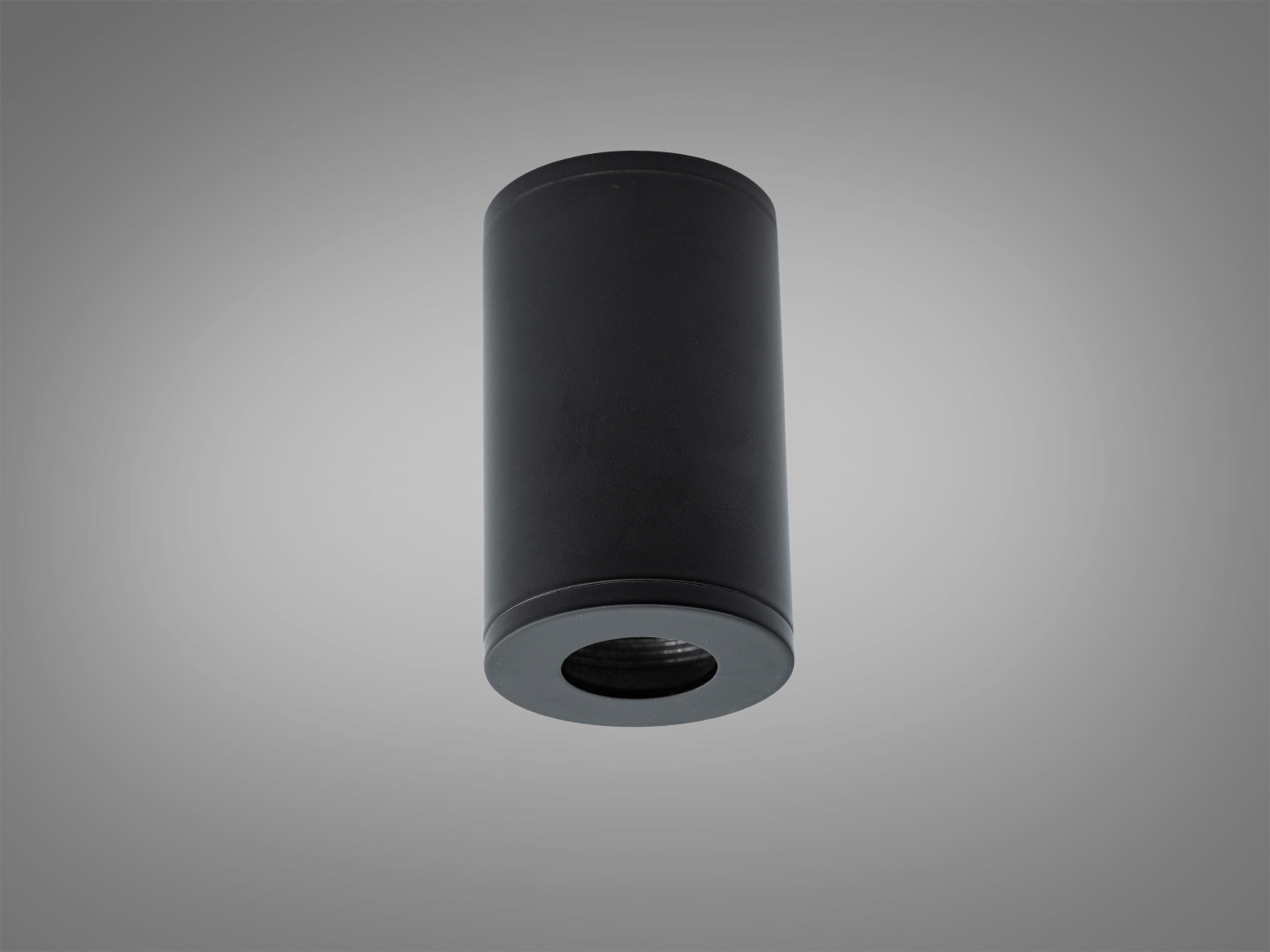 Чорний циліндричний світильник, металевий корпус, призначений для настінного монтажу в сучасних інтер′єрах.