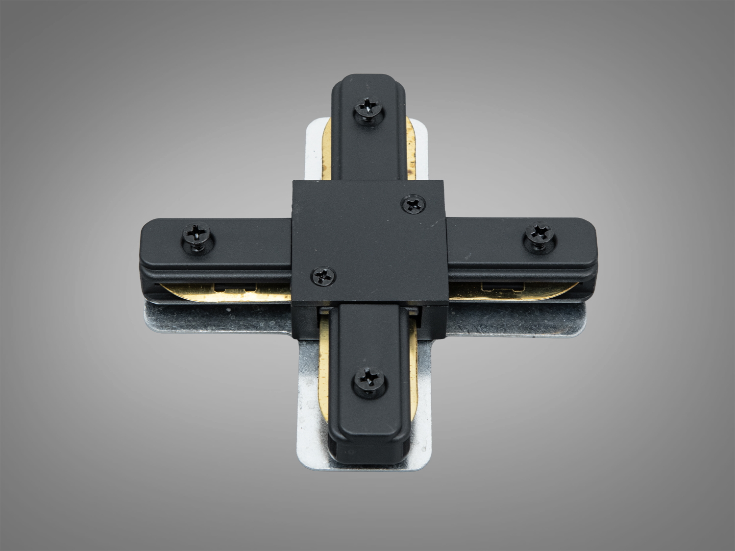 Чорний хрестоподібний конектор для трекових світильників, виготовлений з металу, з видимими гвинтами для кріплення.