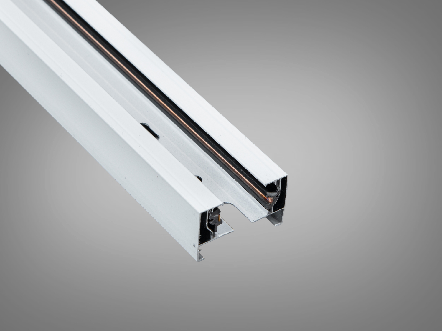 Білий шинопровід 1209, 220 В, довжина 3 м. Підвісний або накладний монтаж, заглиблені шини для безпечнішої експлуатації, сумісний з трековими світильниками серії 1209.