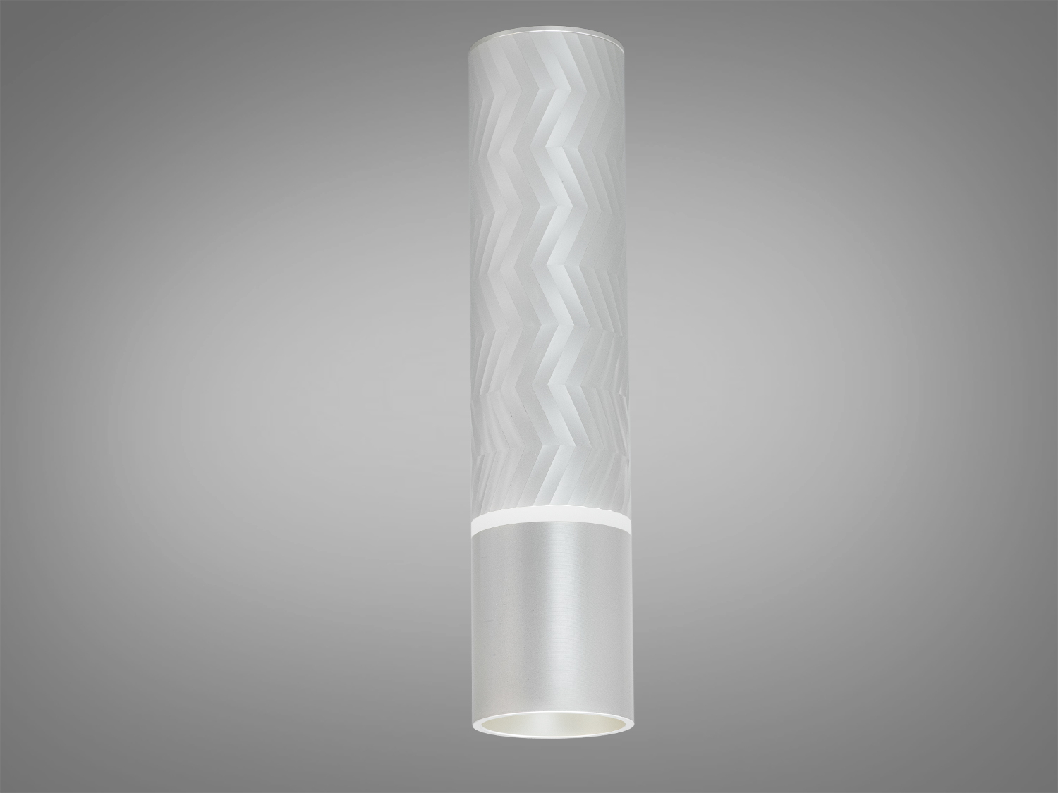 Лампа циліндричної форми з матового скла, має зигзагоподібний візерунок. Ефективно освітлює простір, підходить для мінімалістичних інтер′єрів.