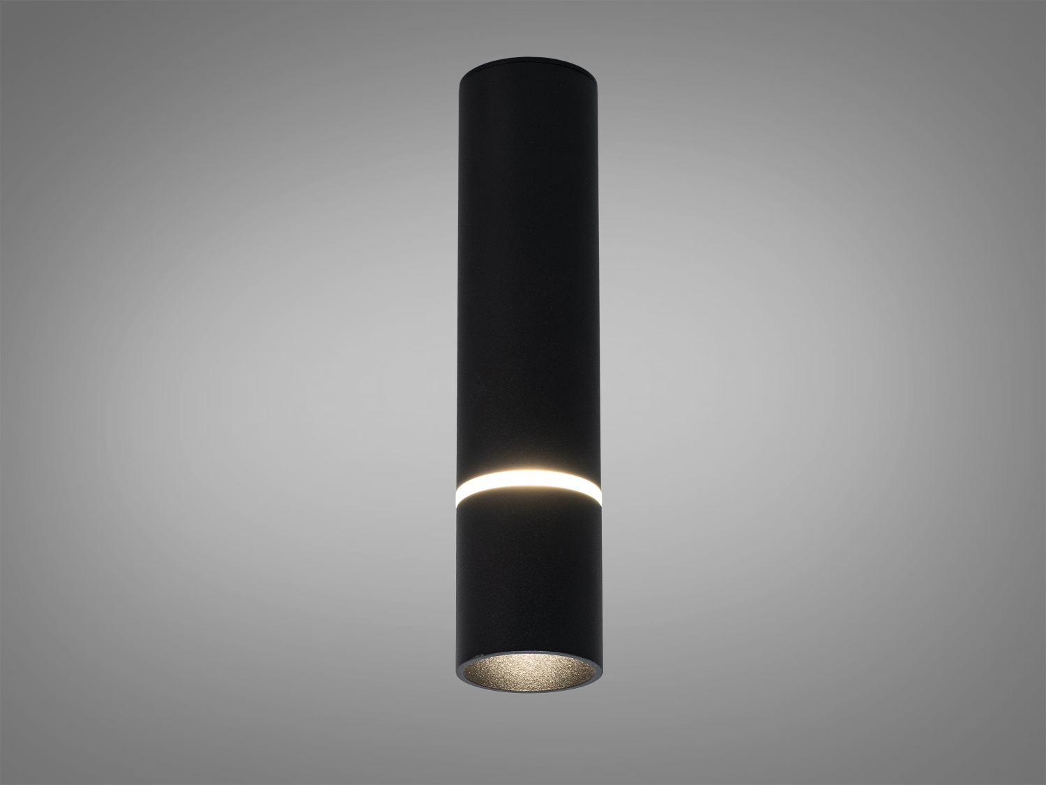 Циліндричний підвісний світильник чорного кольору з акцентним світлом, що підходить для сучасних інтер′єрів, забезпечує м′яке освітлення.