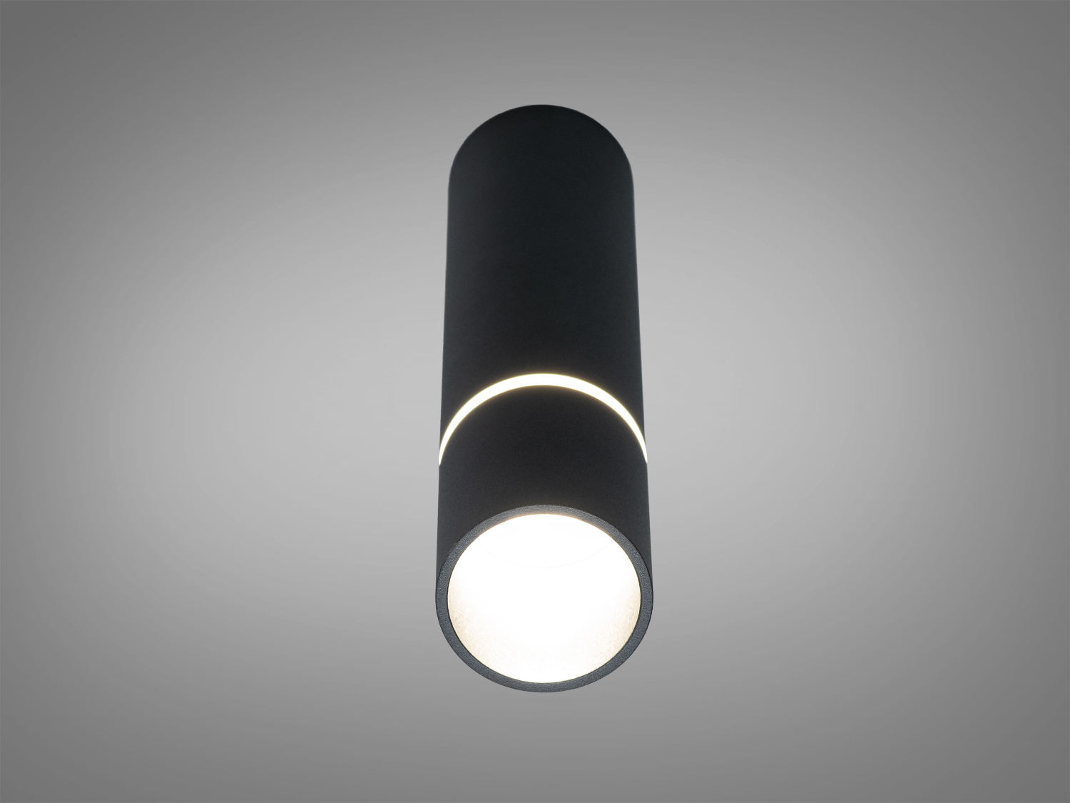 Чорний циліндричний світильник з нижнім світловим потоком, підходить для освітлення робочих зон або акцентування деталей інтер′єру.
