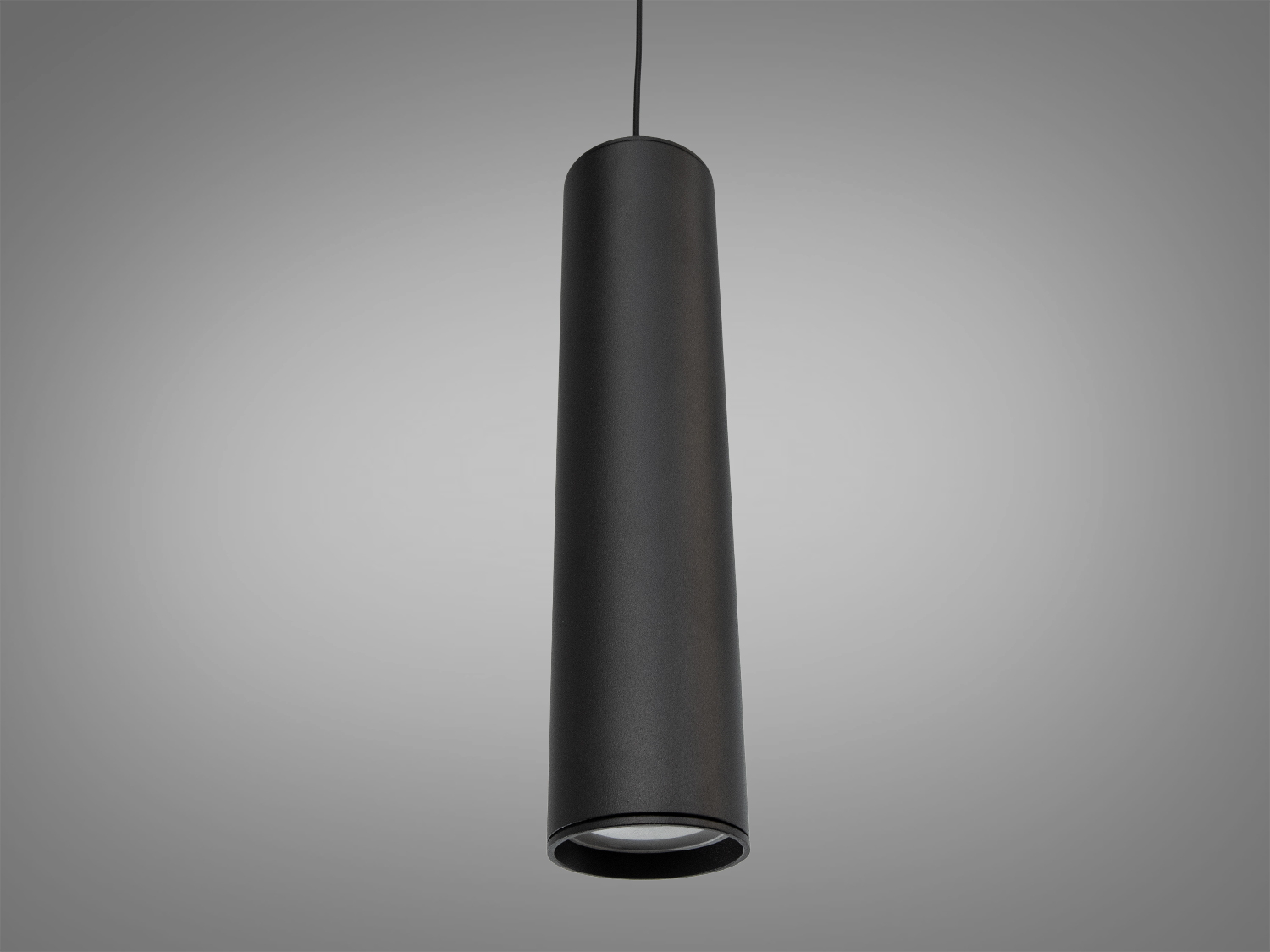 Чорний циліндричний світильник з металу, призначений для точкового освітлення, підходить для офісних приміщень.