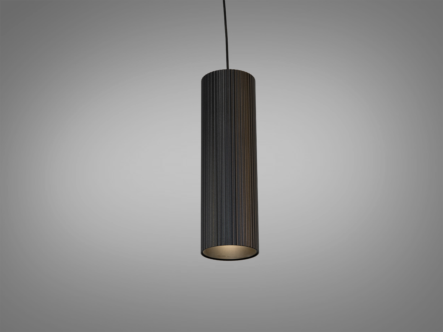 Світильник підвісний з чорного металу, циліндрична форма, забезпечує направлене освітлення, ідеальний для мінімалістичних просторів.