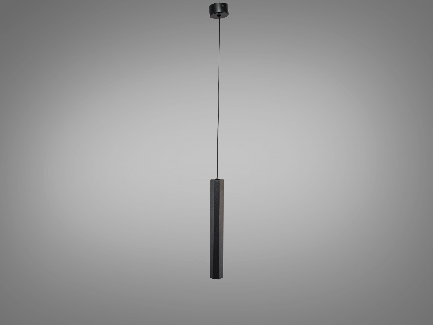 Підвісний світильник чорного кольору з циліндричним корпусом, підвішений на тонкому дроті. Підходить для сучасного інтер′єру.