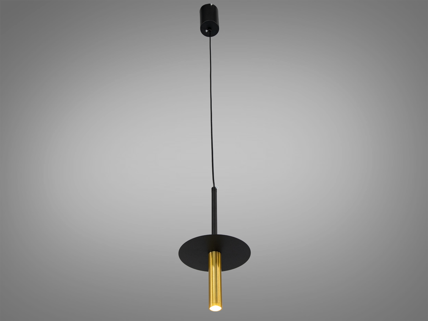 Підвісний світильник з циліндричним золотистим плафоном і чорним диском, підходить для сучасних інтер′єрів.