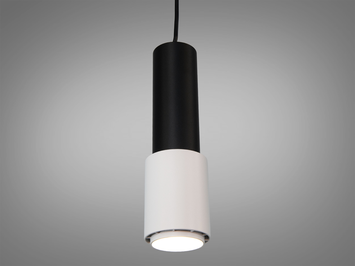 Підвісний світильник-тубус Diasha у кольорі чорний+білий під лампу GU10. Спрямоване акцентне світло для кухні, вітальні, коридорів і вітрин.