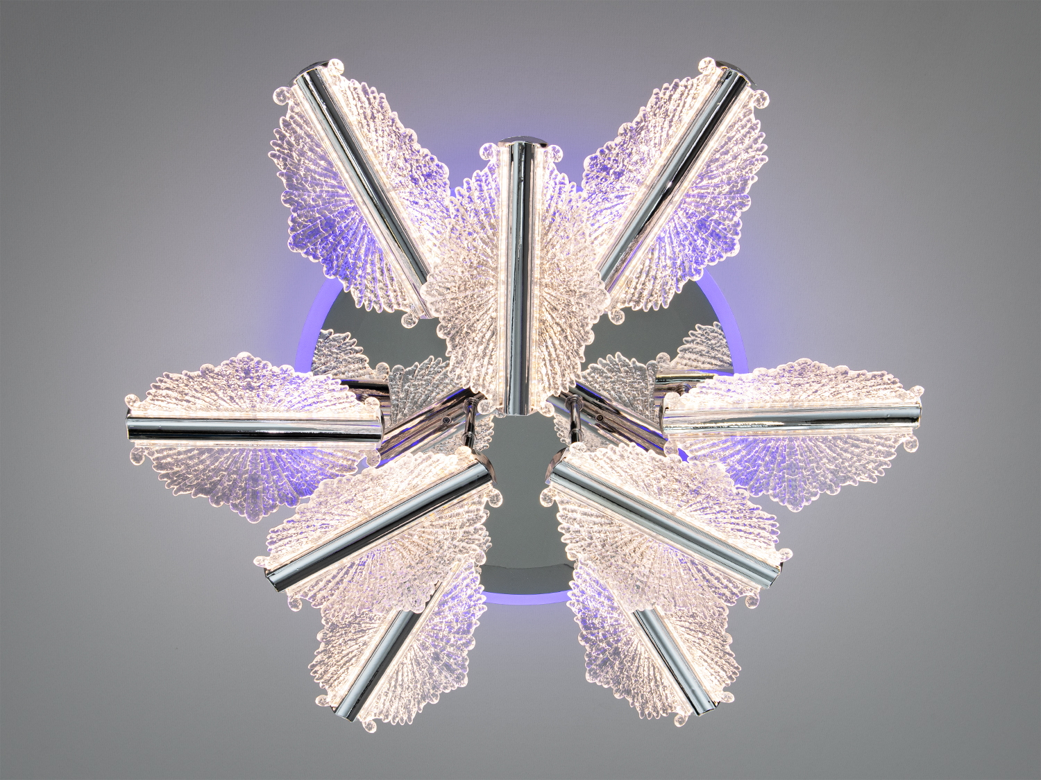 Стельовий світильник з фіолетовим підсвічуванням, виконаний у формі квітки. Прозорий акрил додає сучасності інтер′єру.