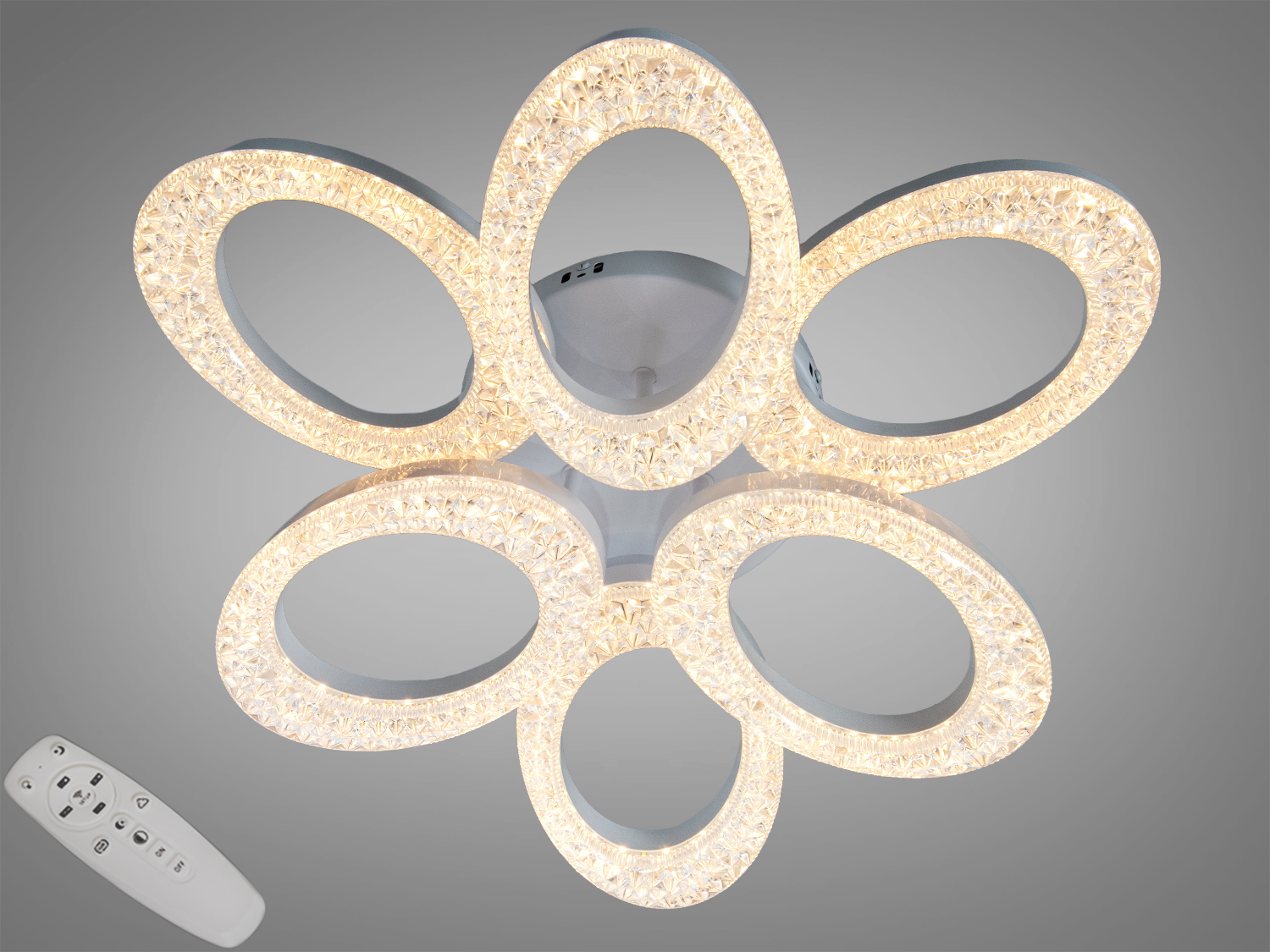 Світильник у формі квітки з шістьма овальними LED кільцями, що підвішується на стелю. Має дистанційне керування.