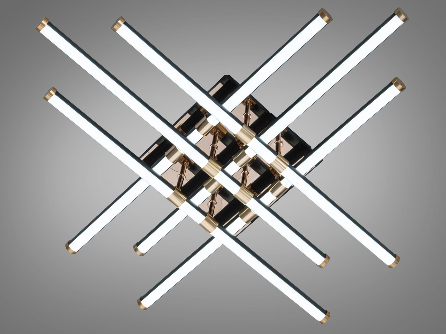 Стельовий світильник з перехресними трубками, що випромінюють нейтральне біле світло. Підходить для офісних приміщень та сучасних віталень.