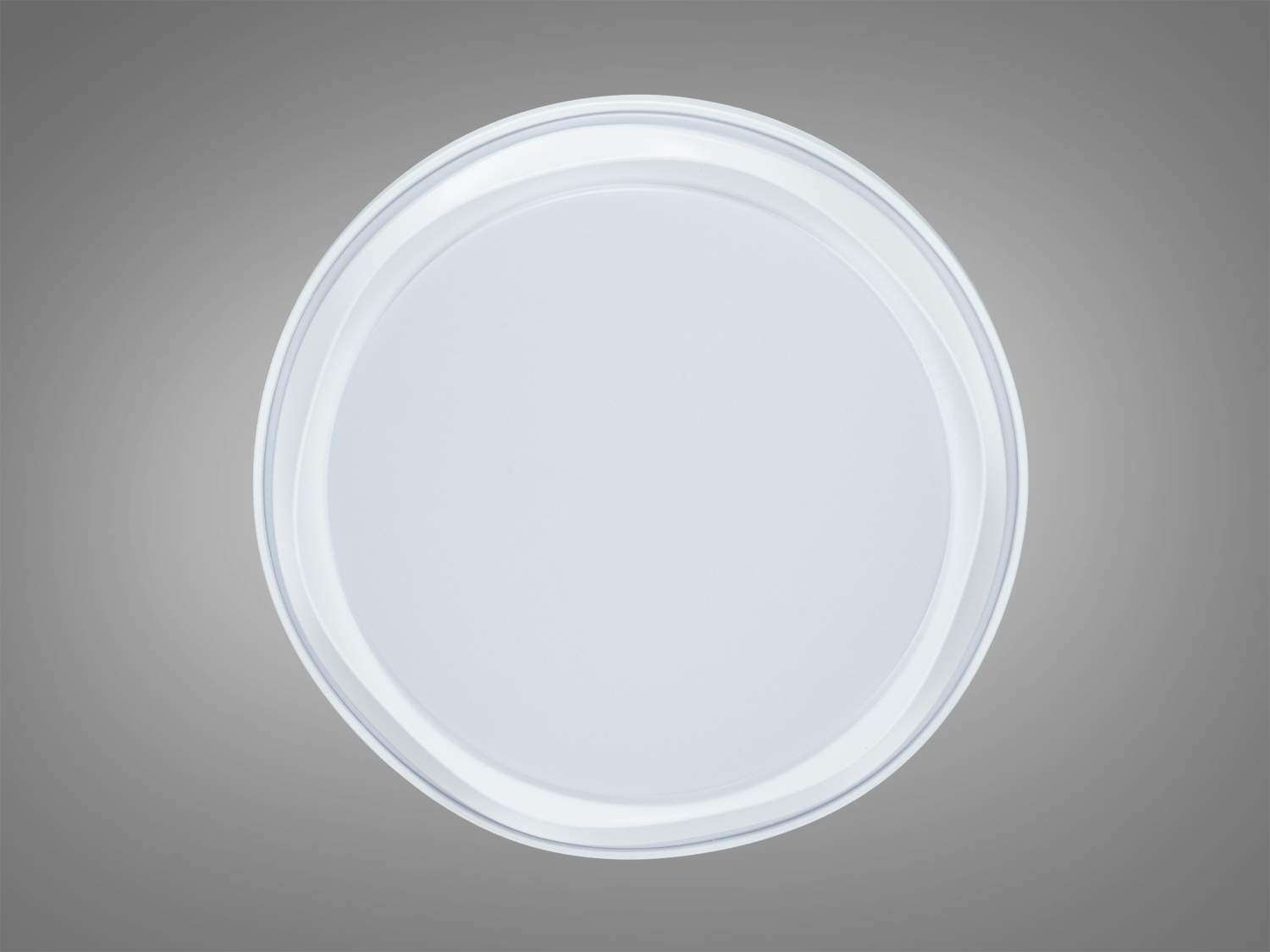 Круглий стельовий світильник з гладким білим покриттям, підходить для офісних приміщень. Зручний для монтажу на стелі.