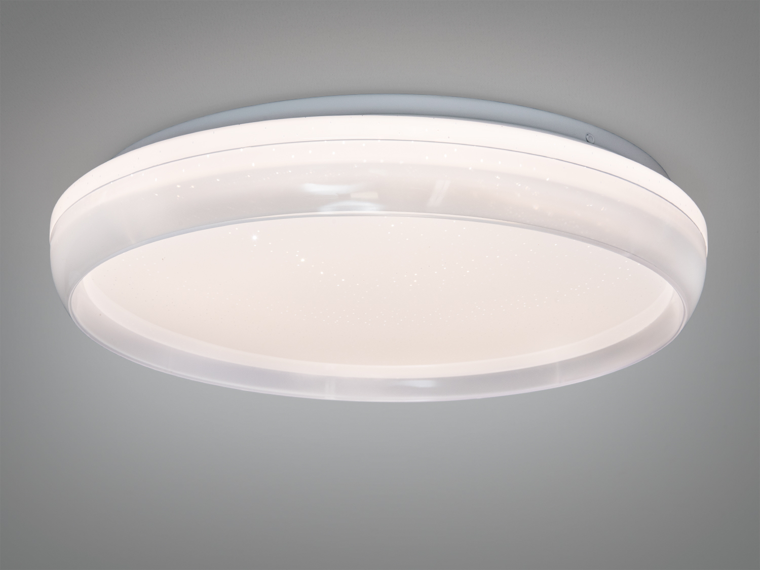 Стельовий світильник з прозорим обідком, що створює ефект зіркового неба. Ідеальний для спальні або вітальні.