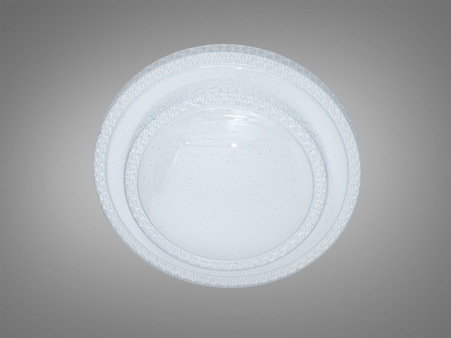 Кругла стельова лампа з дрібними точками на поверхні, що надає м′яке освітлення. Ідеальна для спальні.