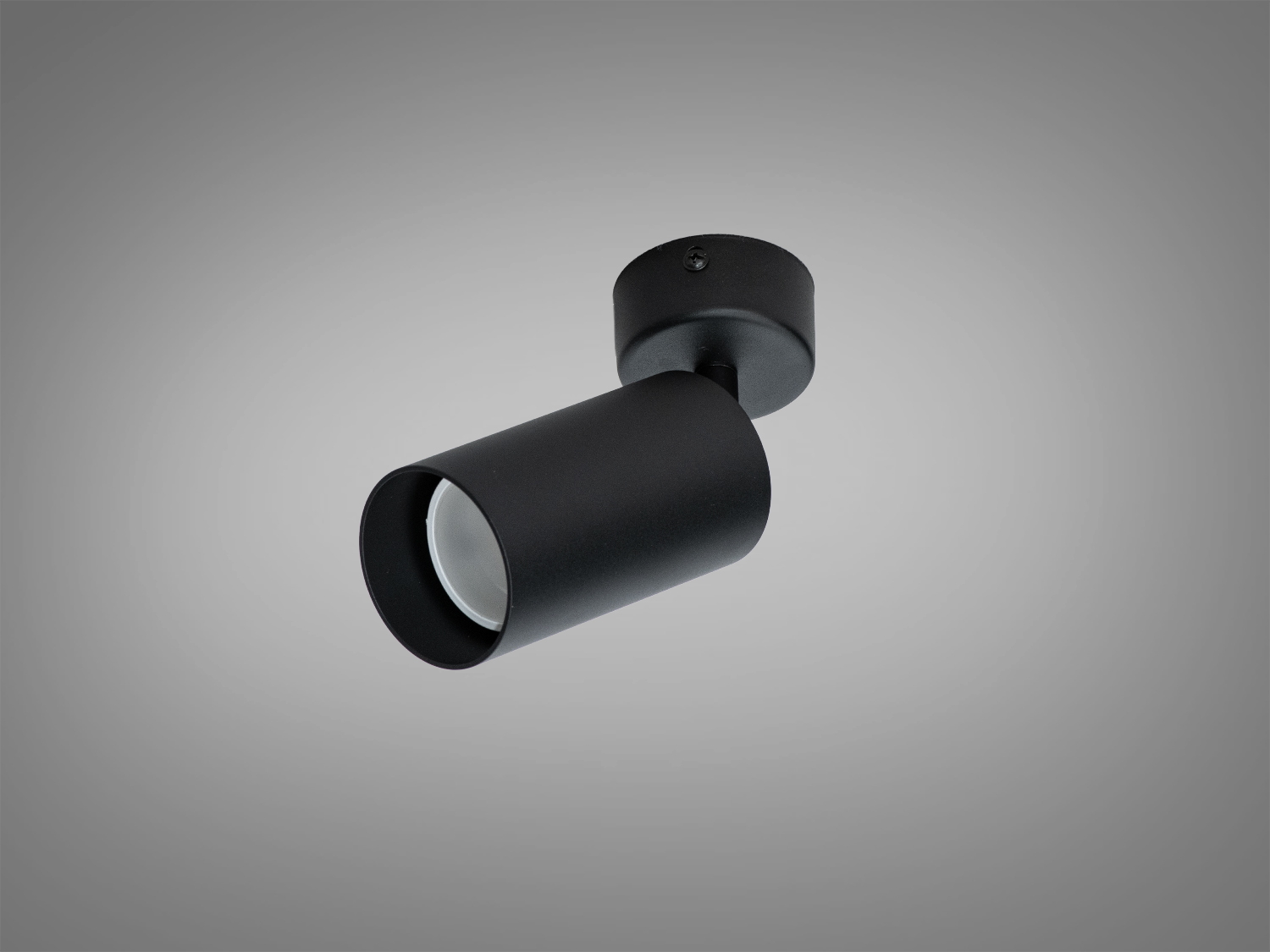 Чорний світильник циліндричної форми, монтується на стелю. Призначений для спрямованого освітлення, підходить для офісів та житлових приміщень.